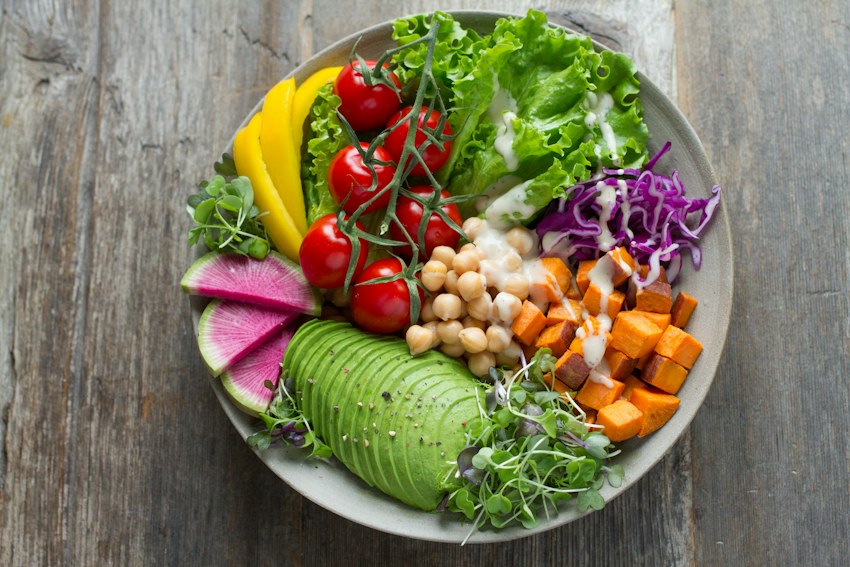 Colorful fresh salad and vegetables in a bowl